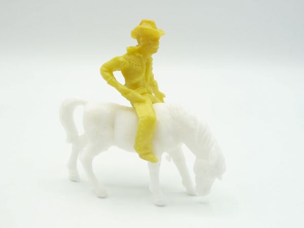 Heinerle Domplast Manurba Cowboy riding, pulling pistol, yellow