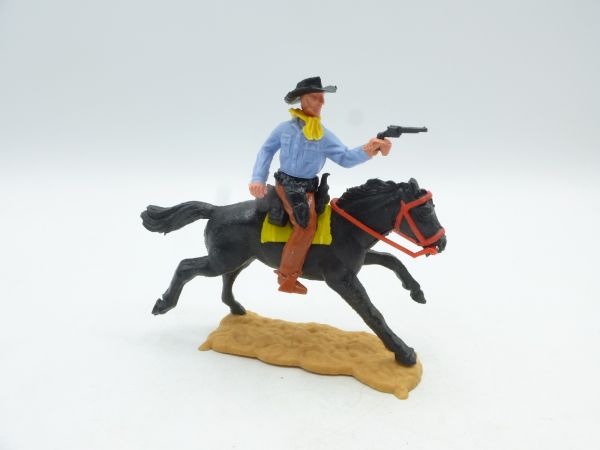 Timpo Toys Cowboy riding with pistol (black)