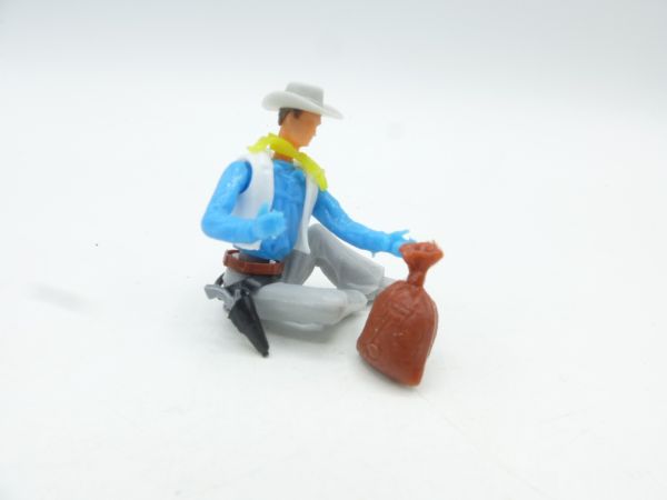 Elastolin 5,4 cm Cowboy sitzend mit Geldsack