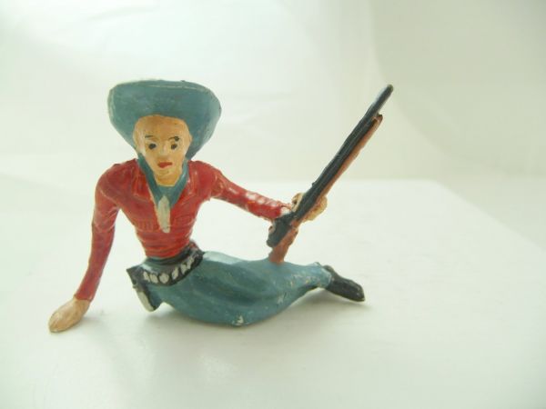 Merten 6 / 7 cm Cowboy sitting on side with rifle - very early figure