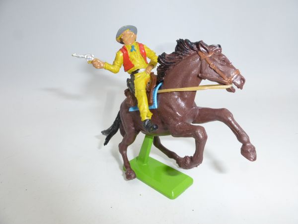Britains Deetail Cowboy on horseback, shooting pistol from the side