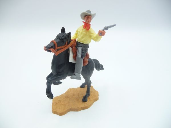 Timpo Toys Cowboy 2nd version riding, firing pistol - great horse