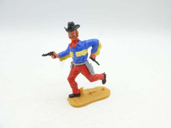 Timpo Toys Cowboy 4. Version mit Fransenhemd, mittelblau/gelb