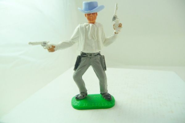 Timpo Toys Cowboy 1. Version mit 2 Pistolen wild schießend