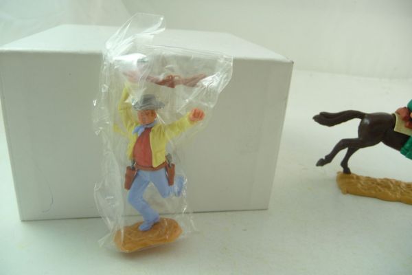 Timpo Toys Cowboy 3rd version running, hit by arrow - brand new
