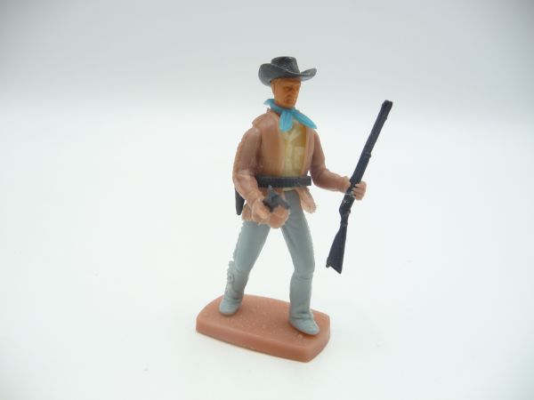 Plasty Cowboy stehend mit Pistole + Gewehr
