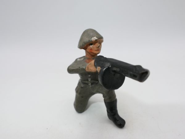 Soldier kneeling with MG - see photos