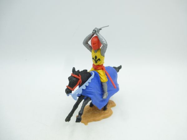 Timpo Toys Medieval knight on horseback, yellow/red, striking ambidextrously