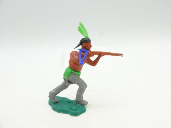 Lone Star Indian advancing with rifle