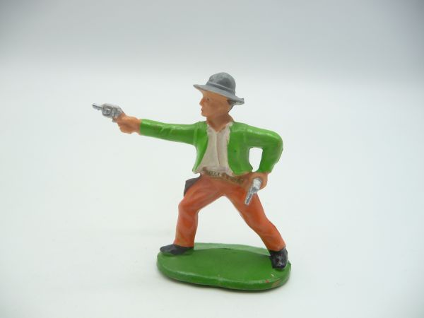 Cowboy standing with 2 pistols (neon green jacket)