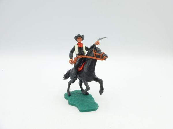 Timpo Toys Cowboy riding with pistol + rifle - nice rearing horse
