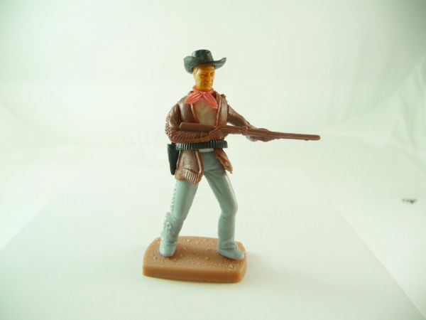 Plasty Cowboy standing with rifle
