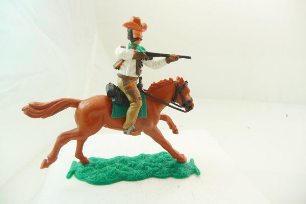 Timpo Toys Cowboy reitend mit Gewehr - toller Hut, tolle Farbkombi
