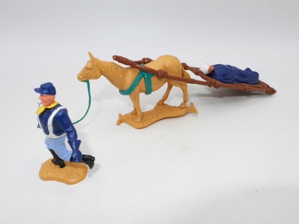 Timpo Toys Northerner with wounded man on stretcher (blue blanket)