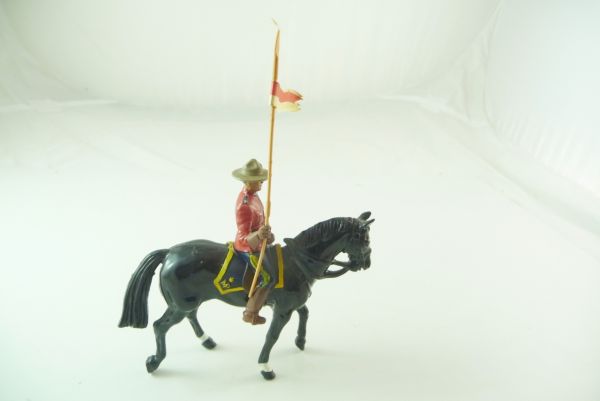 Britains Mountie riding with flag