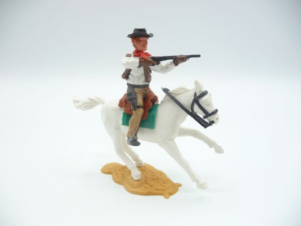 Timpo Toys Cowboy 4. Version reitend, Gewehr schießend