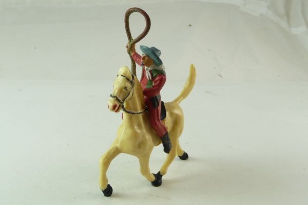 Starlux Cowboy reitend mit Lasso, auf trabendem Pferd - frühe Figur