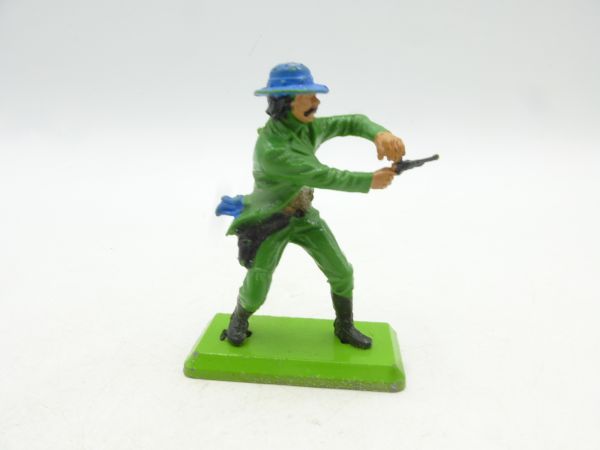 Britains Deetail Cowboy standing, firing pistol ambidextrously, bottle green