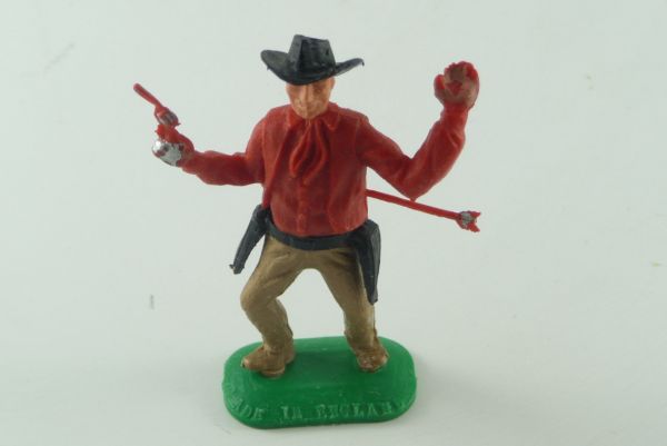 Timpo Toys Cowboy stehend 1. Version von Pfeil getroffen