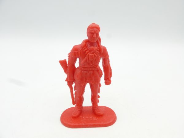 Linde Indian standing, rifle put down sideways, bright red