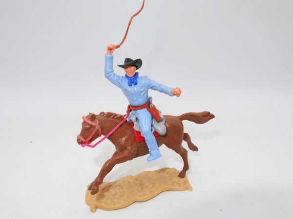Timpo Toys Cowboy 3. Vers. reitend mit Peitsche - seltenes rotbraunes Pferd
