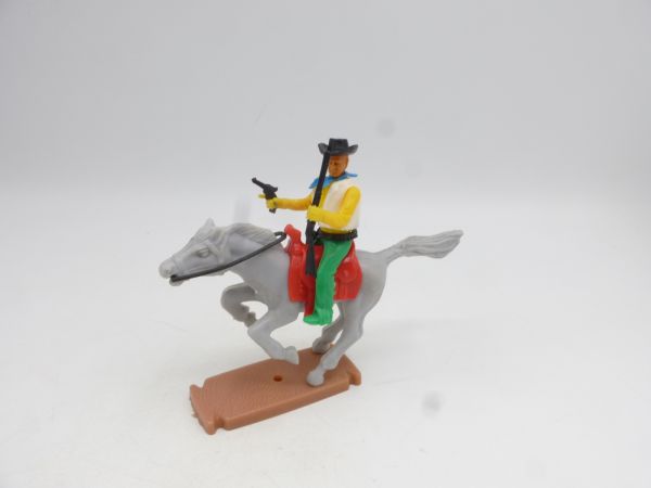 Plasty Cowboy on horseback with pistol + rifle - great trousers