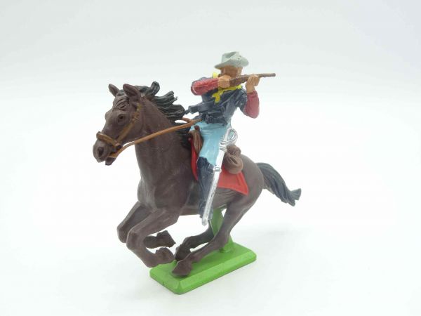 Britains Deetail US cavalryman riding firing with rifle
