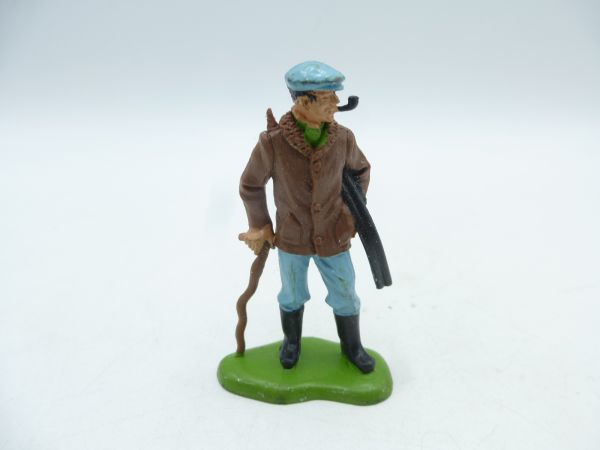 Britains Swoppets Farmer with stick, rifle + pipe, brown jacket