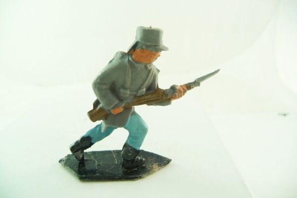 Lone Star Confederate Army soldier storming with bayonet
