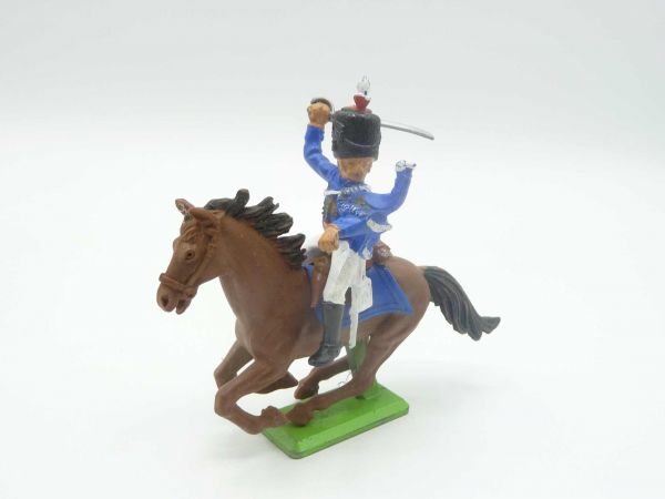 Britains Deetail Waterloo; soldier riding, blue, striking sabre from above, looking to the left