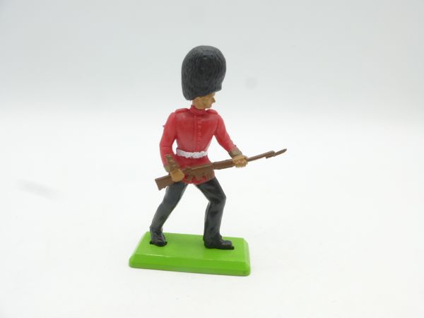 Britains Deetail Guardsman advancing with rifle