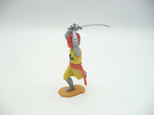 Timpo Toys Mittelalterritter laufend, gelb/rot, Schwert beidhändig schlagend