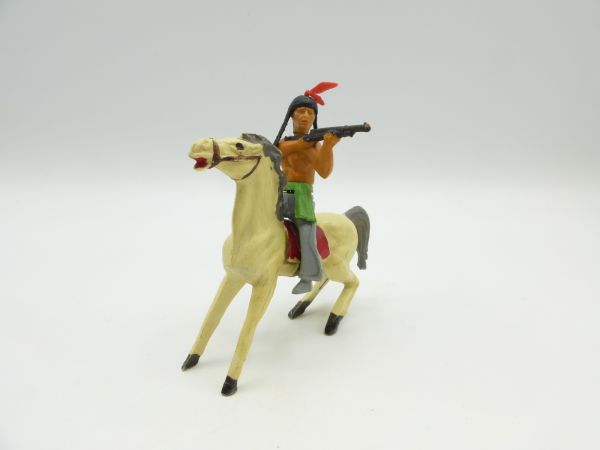 Indian riding, firing gun sideways