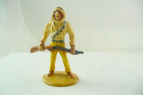 Merten 4 cm Arab standing with rifle in front of the body, yellow - early version