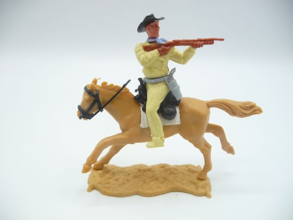 Timpo Toys Cowboy 2nd version riding, firing rifle backwards