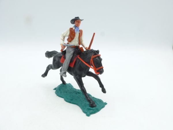 Timpo Toys Cowboy 2nd version riding with rifle + pistol