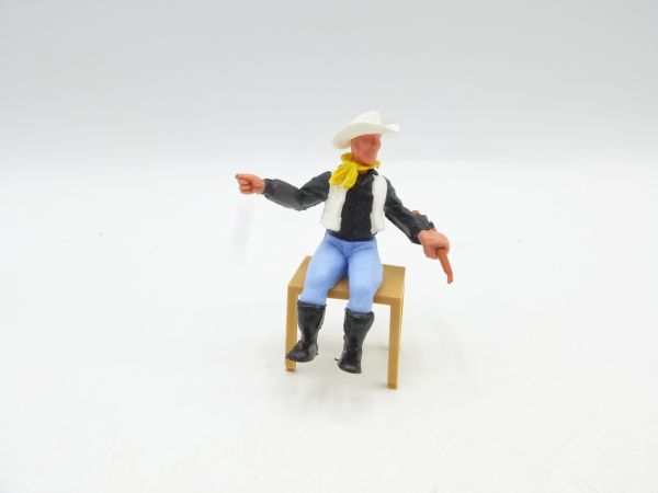 Timpo Toys Cowboy 2. Version auf Tisch sitzend (inkl.), weißer Hut