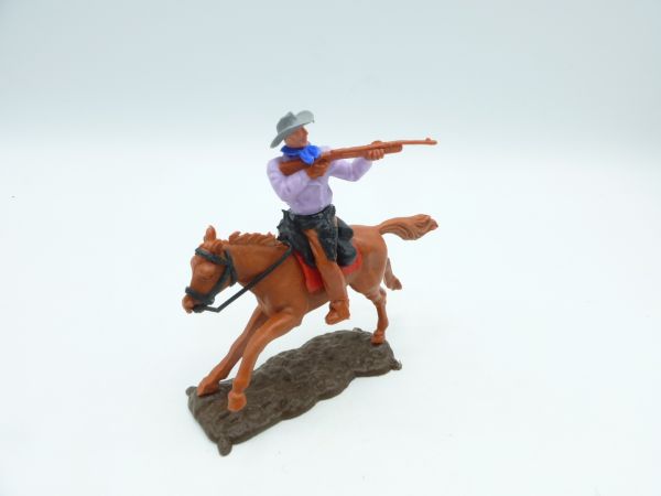Timpo Toys Cowboy riding, firing rifle - nice base plate