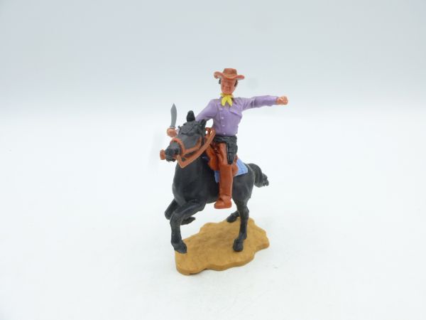 Timpo Toys Cowboy 3rd version on horseback with knife