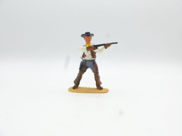 Timpo Toys Cowboy 4. Version stehend, Gewehr schießend