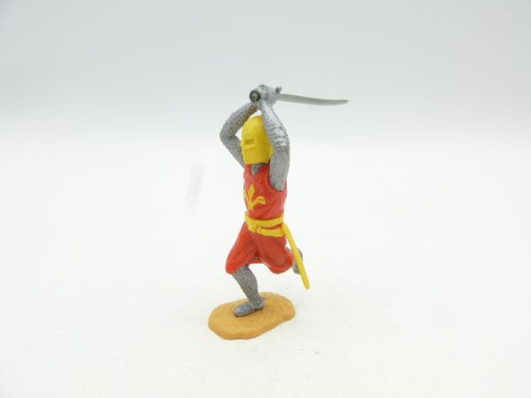Timpo Toys Mittelalterritter laufend, rot/gelb, Schwert über Kopf