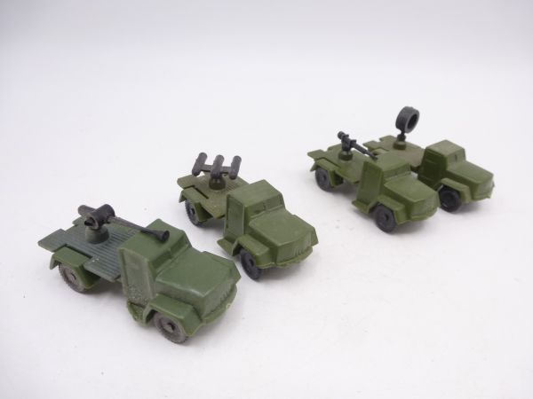 4 small trucks (similar to Roco / Roskopf)
