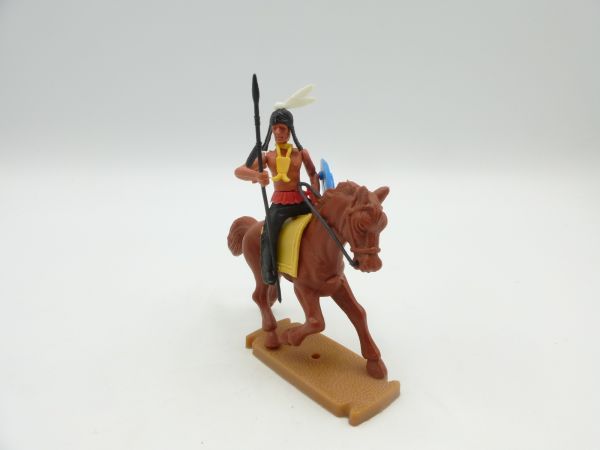 Plasty Indian riding, holding spear sideways