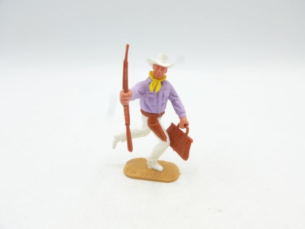 Timpo Toys Cowboy running with rifle + money bag, white hat