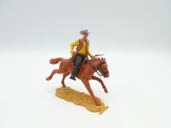 Timpo Toys Cowboy 2. Version reitend, 2 Pistolen schießend