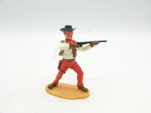 Timpo Toys Cowboy 4th version standing shooting, red trousers