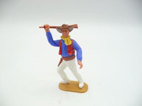 Timpo Toys Cowboy 2. Version laufend mit Gewehr schlagend - ladenneu