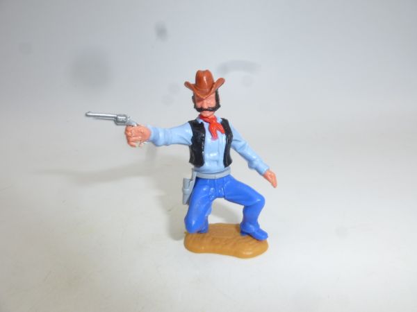 Timpo Toys Cowboy 3rd version (big head) crouching, shooting pistol