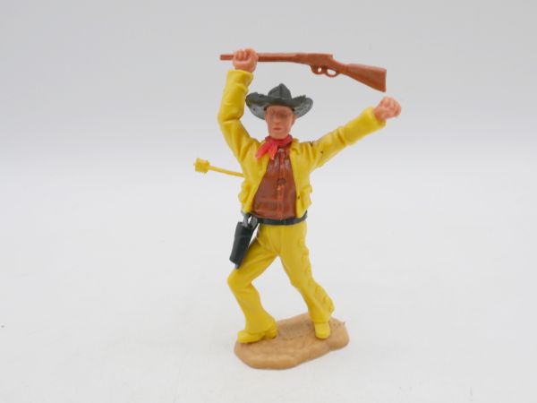 Timpo Toys Cowboy, vom Pfeil getroffen, schwarzer Gurt
