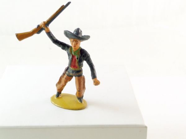 Merten 6,5 cm Cowboy stehend, Gewehr hochhaltend - schöne frühe Figur